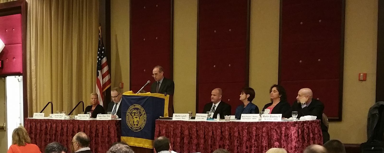 Acting Director of the Division of Taxation, John Ficara (center). Executive board of the Association of Municipal Assessors of New Jersey. 